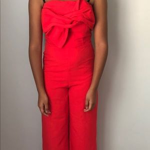 Red jumpsuit with back cut out!